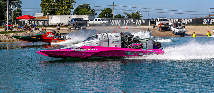 Shelby Ebert (near lane) and Forrest Warren posted near-identical elapsed times in their round one matchup, but Shelby picked up a slim -.007 red light, advancing Forrest automatically.