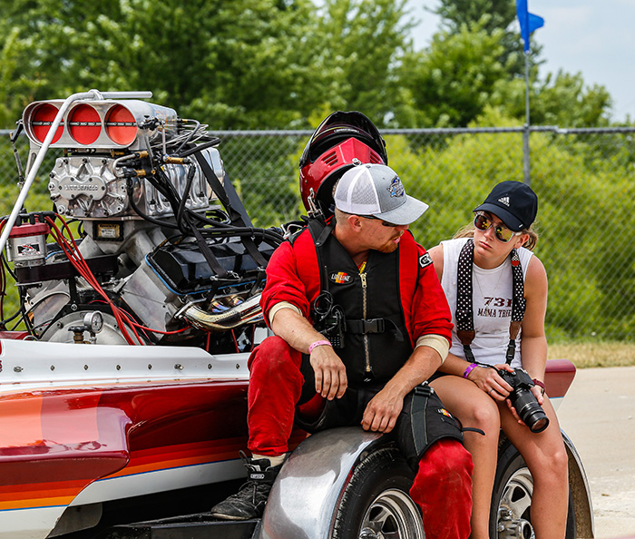 Kris Mosier waits for his turn at the starting line with the support of his significant other, Kaela Peterson.