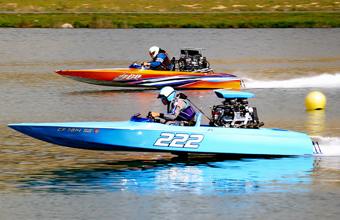 In round two of PCF eliminations between Gary Riggins and Craig Lucas (near lane), Gary ran closer to his dial-in, but Craig took the win on a hole shot.