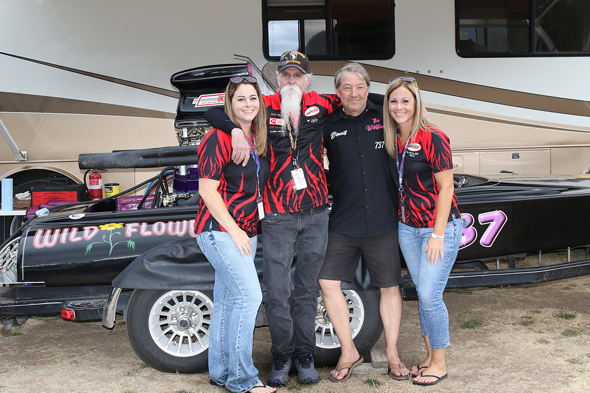 The CDBA tech team  with Dennis Flint. Head tech guy Eric Black owned this hull and raced himself for many years.