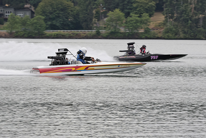 Dennis Flint, far lane, also used a start line advantage over Eric Oleson to advance to the ME final